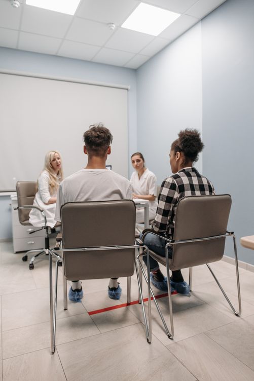 Medical team in a conference room discussion — residency program